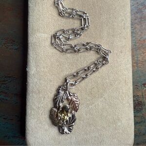 Elegant Silver and Gold Leaf Pendant Necklace